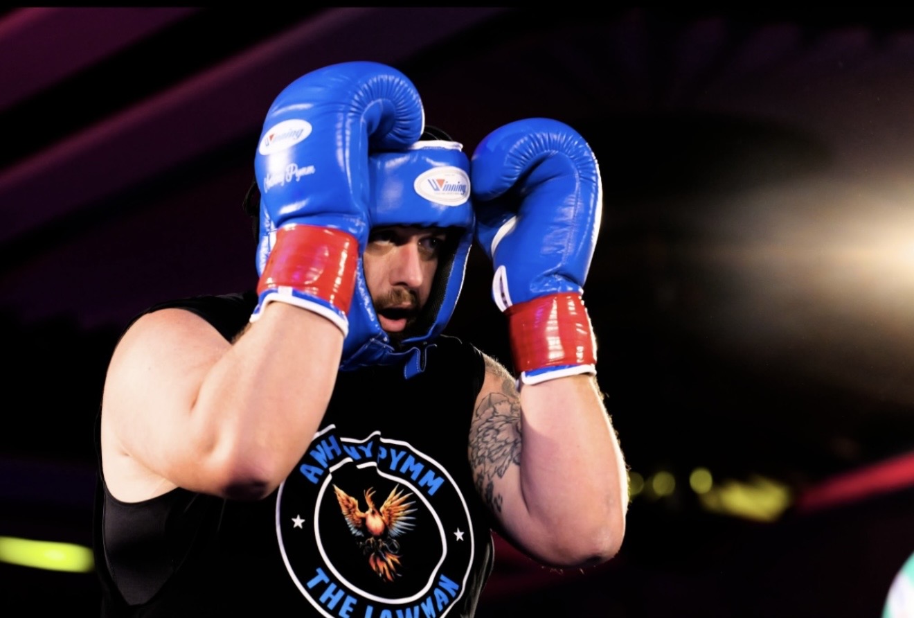 Anthony Pymm defending during the corporate boxing event