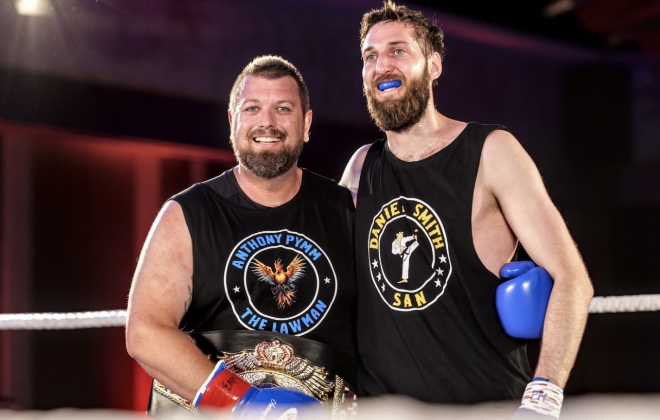 Anthony Pymm and Daniel Smith together after their corporate boxing bout